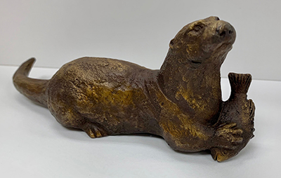 Otter with Fish Sculpture