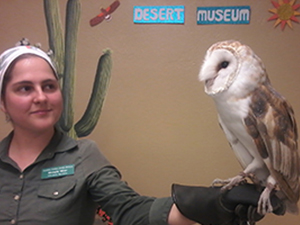 Photo of Educator Michelle with owl