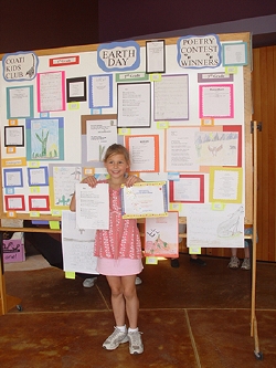 Ashley poses with her poem