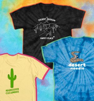 Tie dye background showing 3 new Desert Museum shirt designs